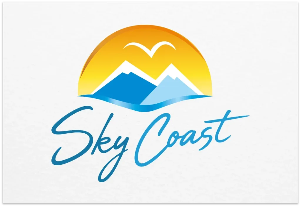 Sky Coast travel logo with mountains, blue waves, a bird and a golden sunset